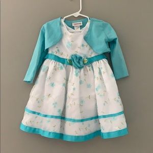 Sleeveless dress with matching cardigan